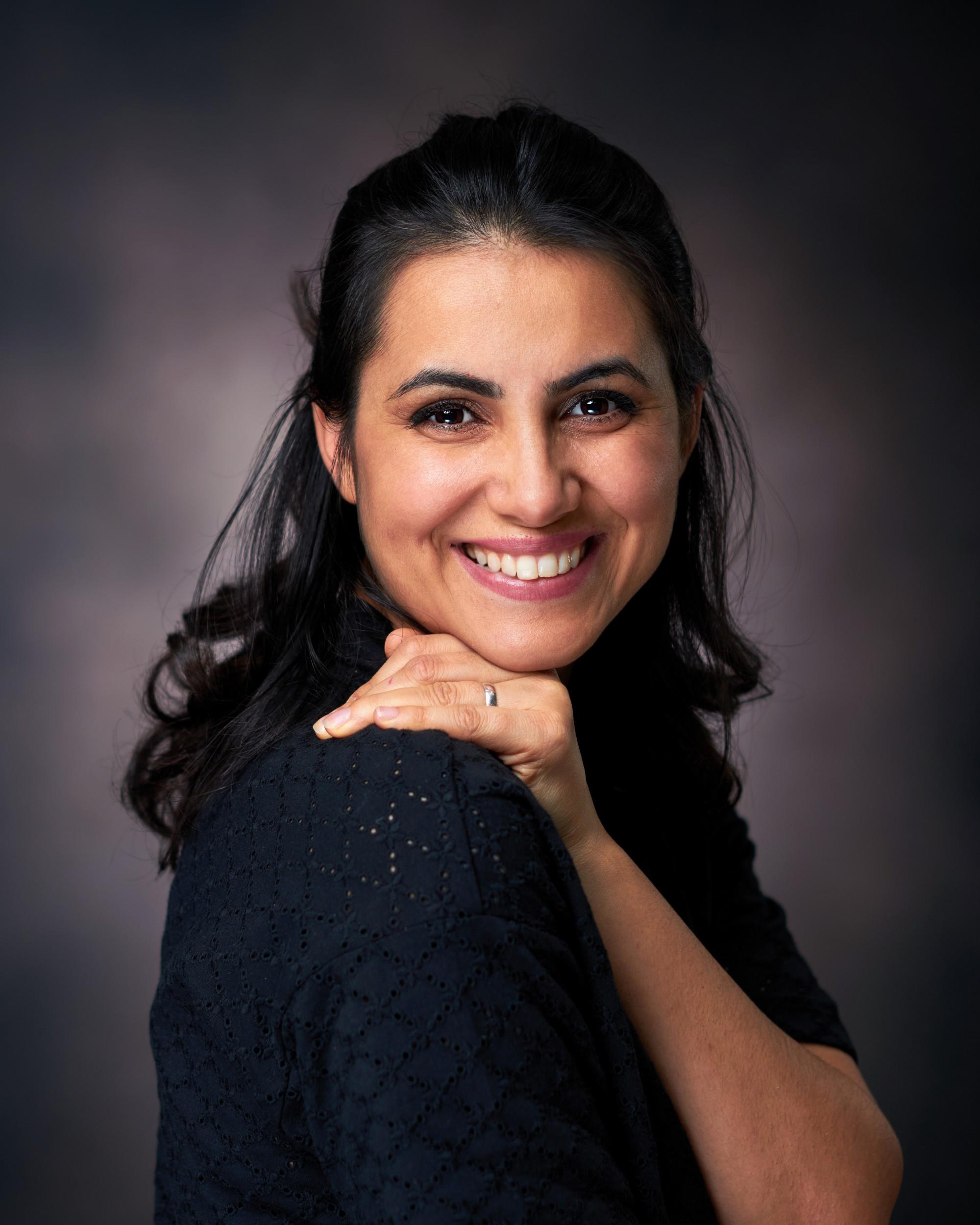 Brown Background Headshot Session with Ivanka in Enfield Albany Park Area