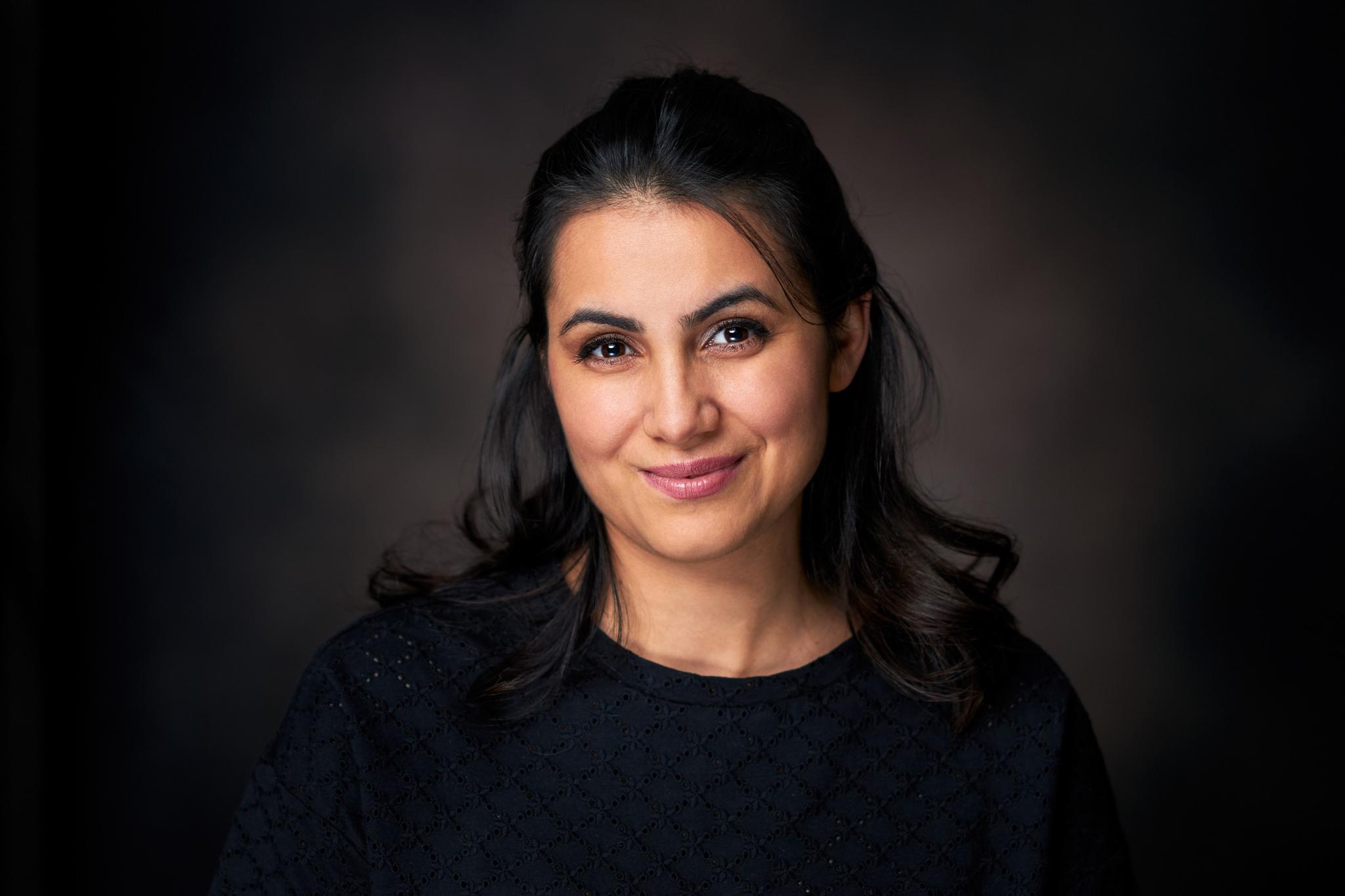 Brown Background Headshot Session with Ivanka in Enfield Albany Park Area